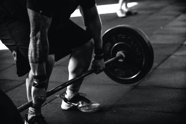 A man holding a barbell