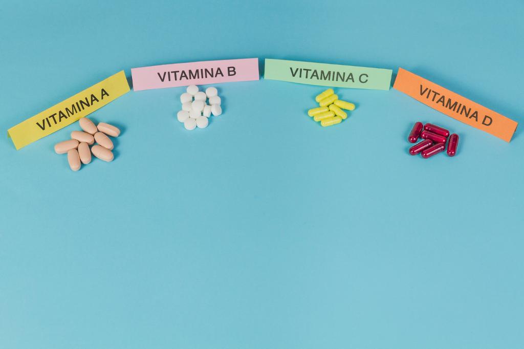 Grupo de comprimidos e cápsulas mostrando diferentes vitaminas