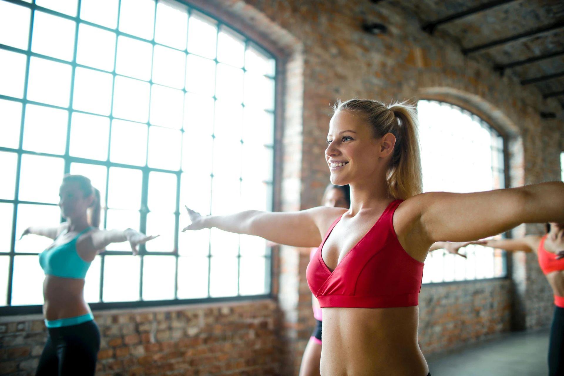 Magnesium Benefits for Women: What You Need to Know A women doing exercise in the gym
