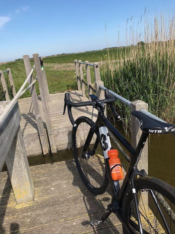 Why should I replenish elecrtolytes? Bike over wooden bridge